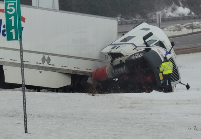 Truck off the road Wednesday night in slippery, whiteout conditions