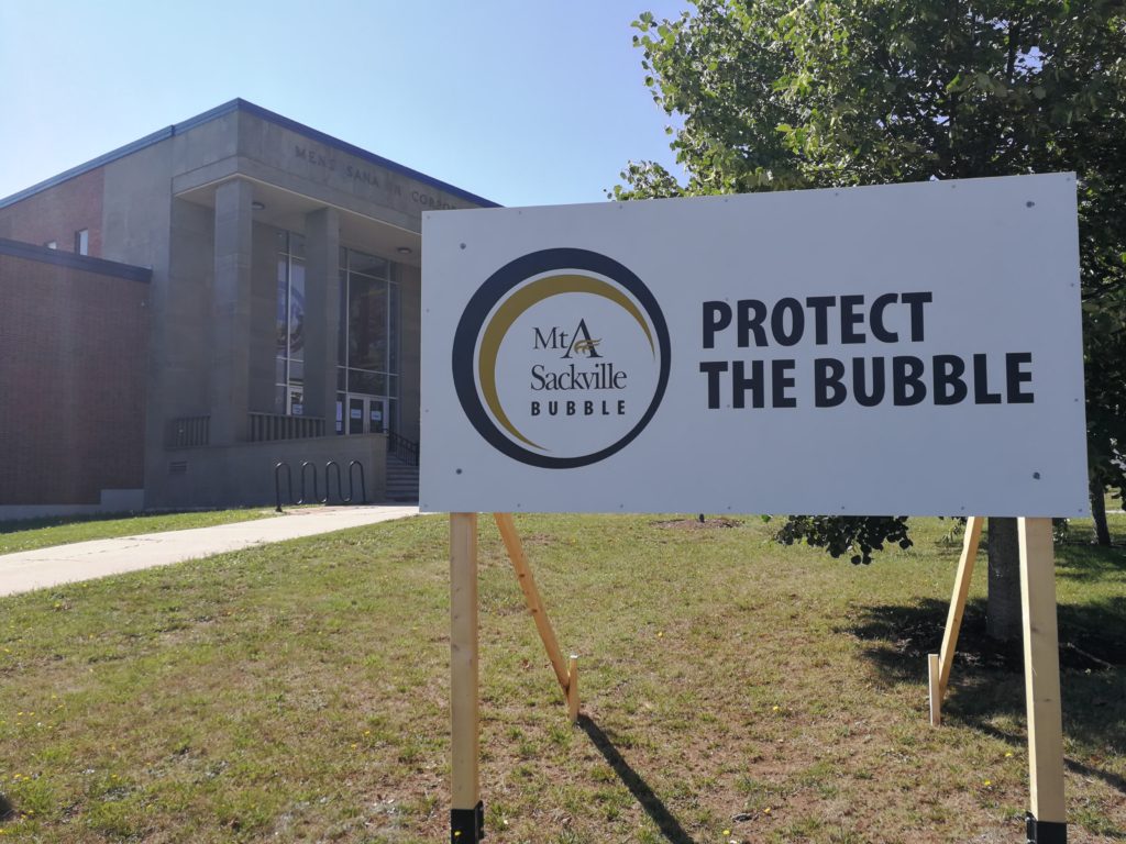 Mt A Protect the Bubble sign outside of the Athletic Centre on York Street in Sackville NB